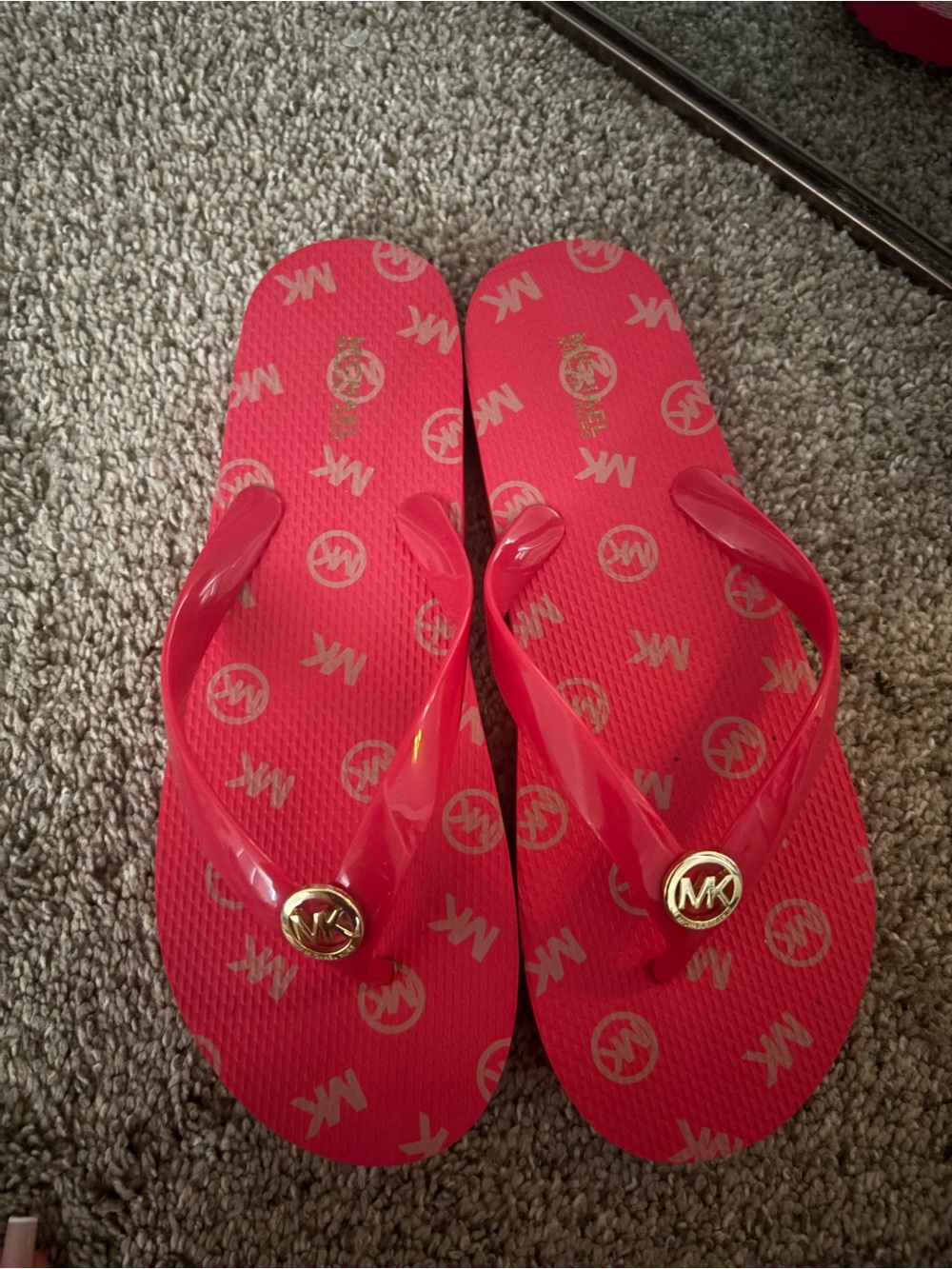 Michael Kors Women's coral pink Logo Flip Flops